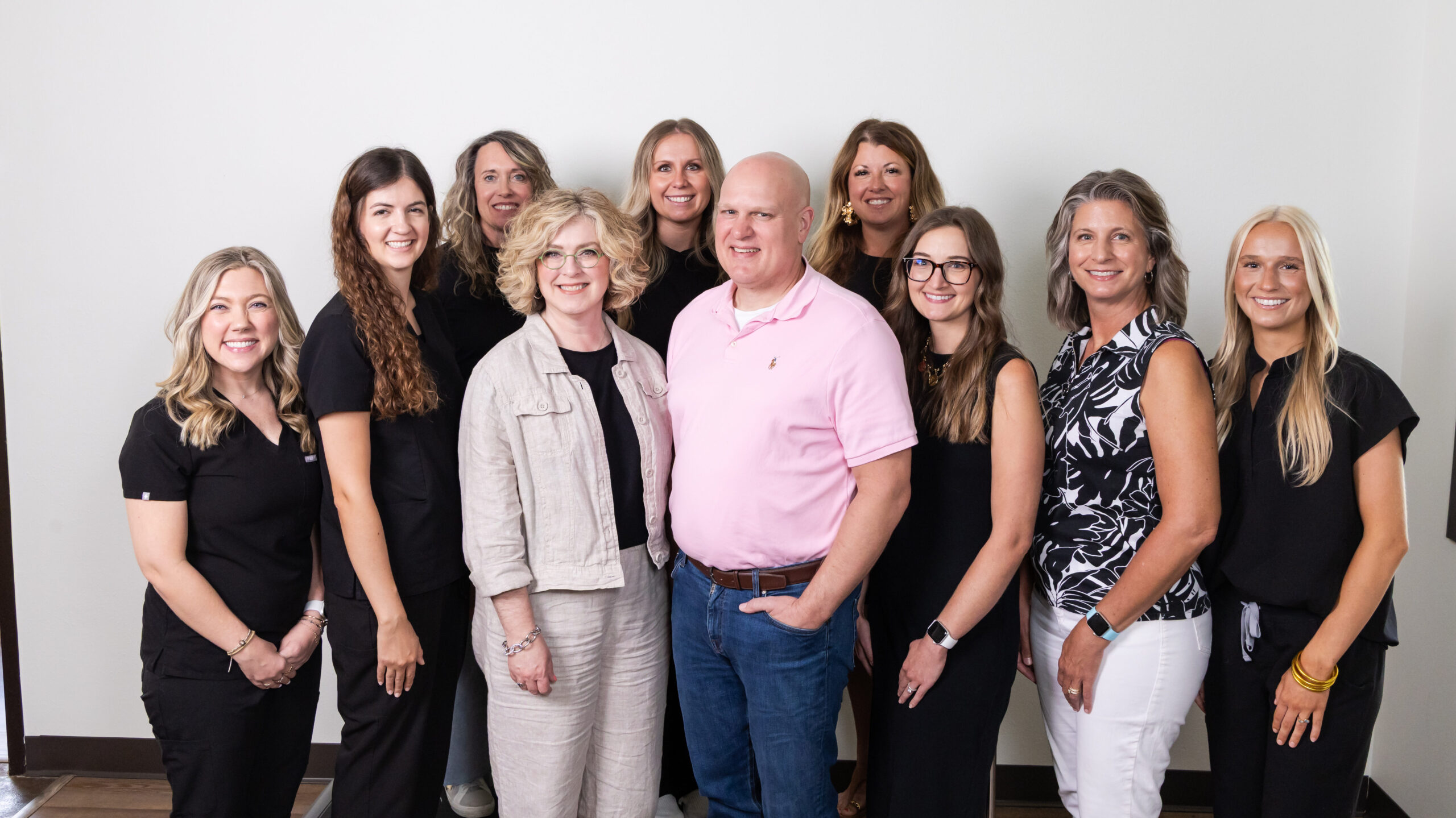 Group photo of Dr. Shane Holland and the staff at Holland Health  Functional Medicine Clinic in Rogers, AR celebrating their wins from the 2025 Best of Northwest Arkansas Awards